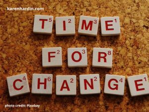 Puzzle pieces that spell "Time for Change"